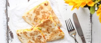 Denver Omelet Breakfast Quesadilla slices on a plate
