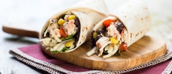 Southwest Chicken Wrap on a wooden plate