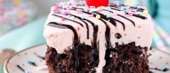 slice of Strawberry Milkshake Poke Cake