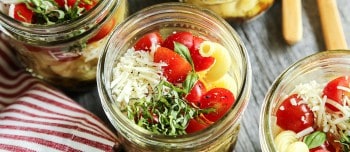 Individual Caprese Pasta Salads served in jars