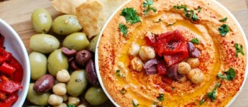 Roasted red pepper Greek yogurt hummus in a bowl