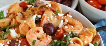 One Pot Mediterranean Shrimp Pasta with Lactose-Free Cream Sauce in a bowl