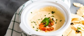 Verde Queso Blanco dip in a slow cooker pot