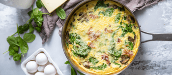 Spinach and cheese frittata in a pan