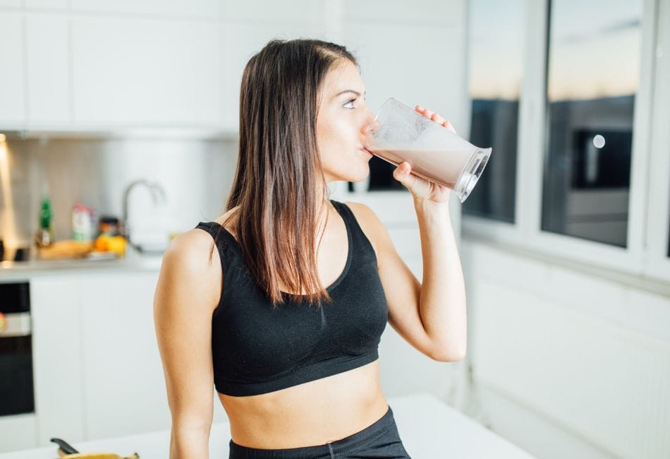 Woman Drinking Chocolate Milk Performance and Recovery